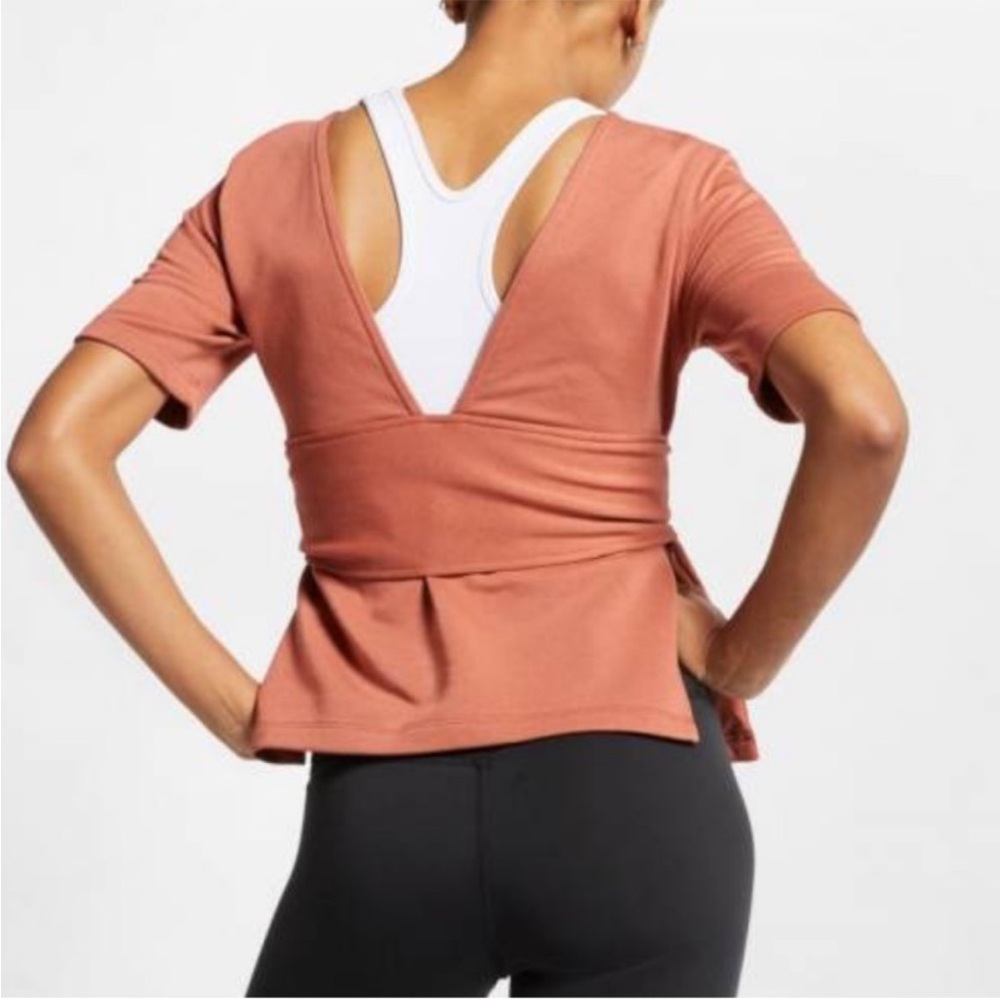 Nike Women's Dri-FIT Studio Short Sleeve Yoga Top, Dusty Peach Size XS, Wrap Tie